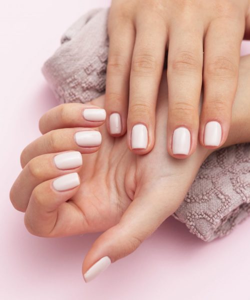 woman-showing-her-beautiful-nails